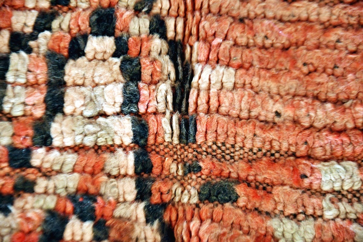 Red abstract boujaad vintage rug morocco black white close up