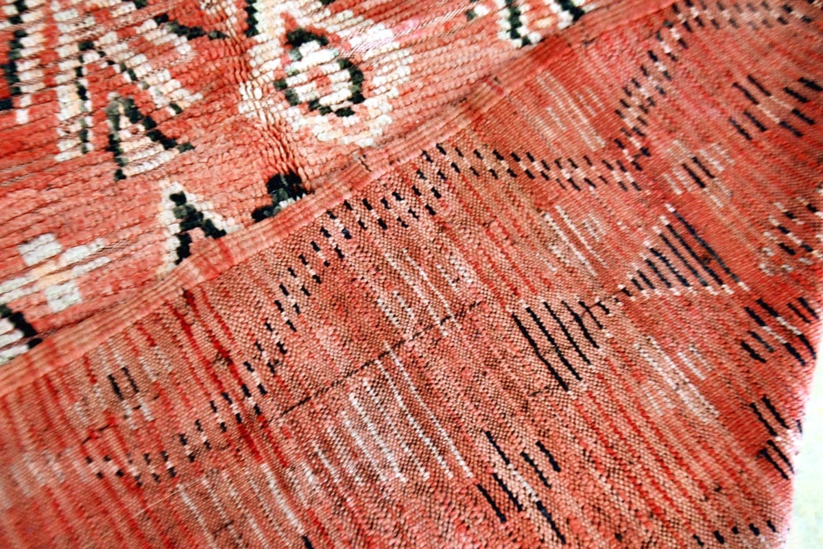 Red abstract boujaad vintage rug morocco black white back