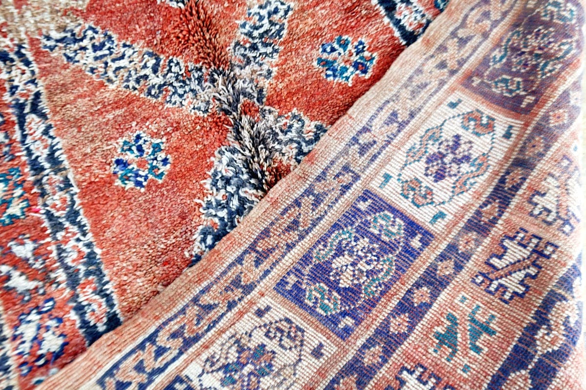 Rust blue vintage bujaad rug symethrical back