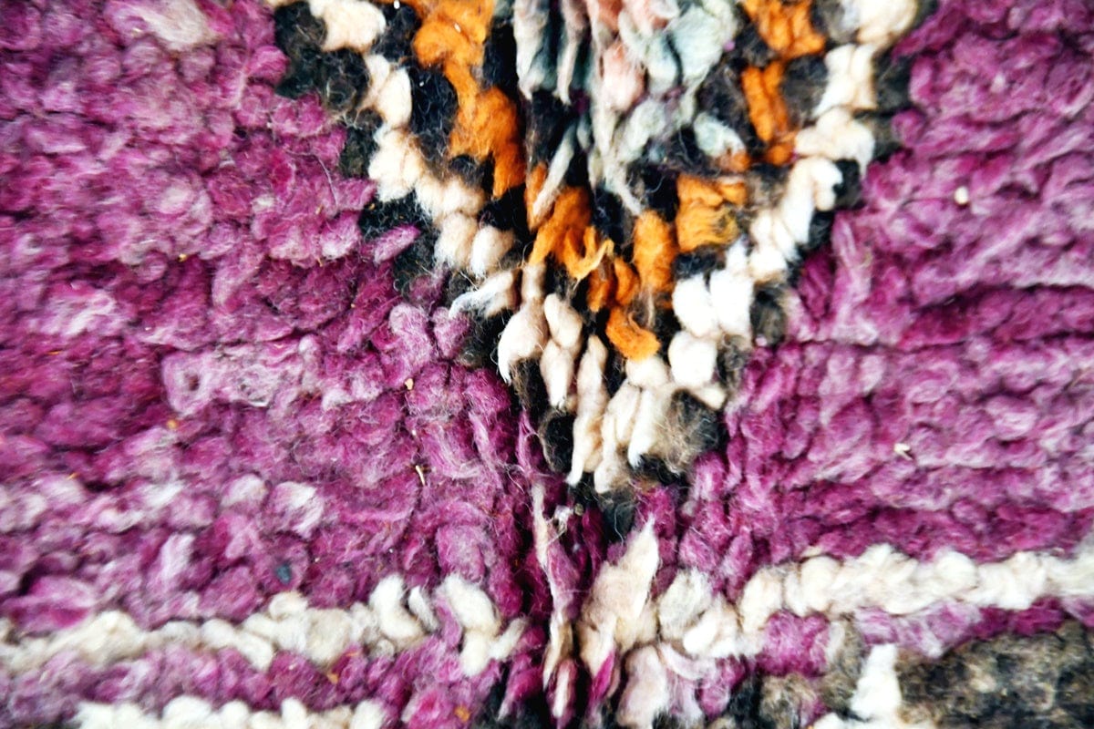 Rare purple orange vintage Boujaad Moroccan rug close up