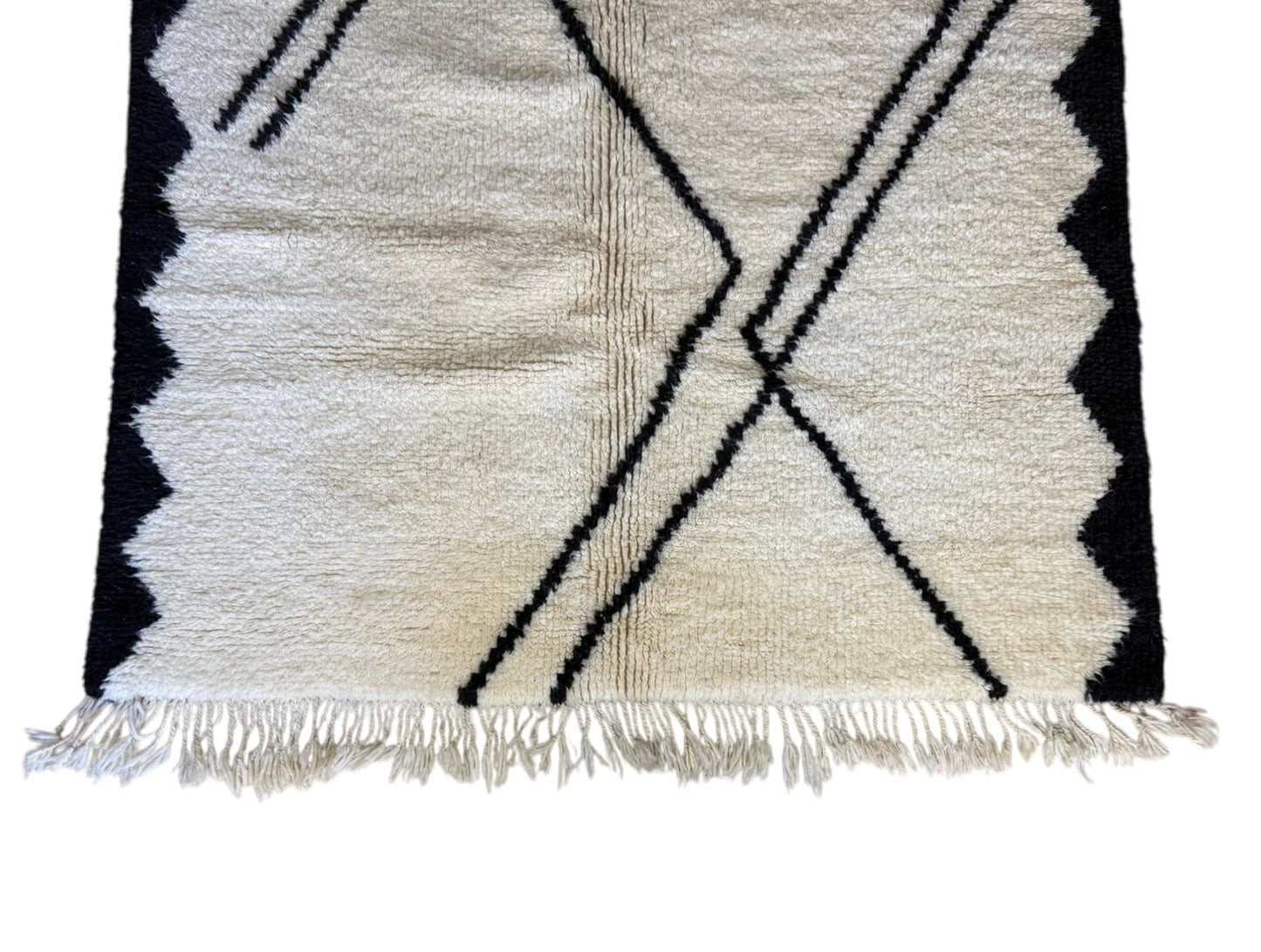 Black and white Beni Ourain rug bottom with tassels