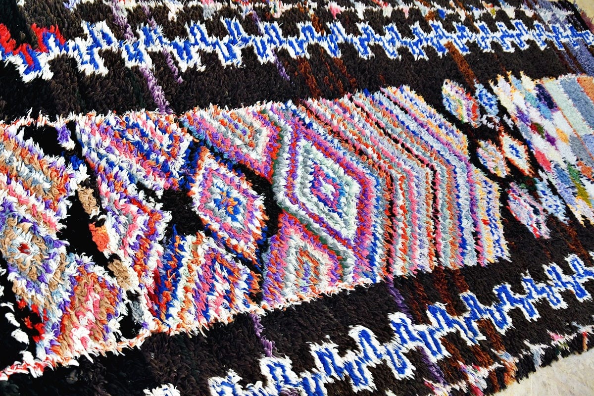Boucherouite black blue rug close up side