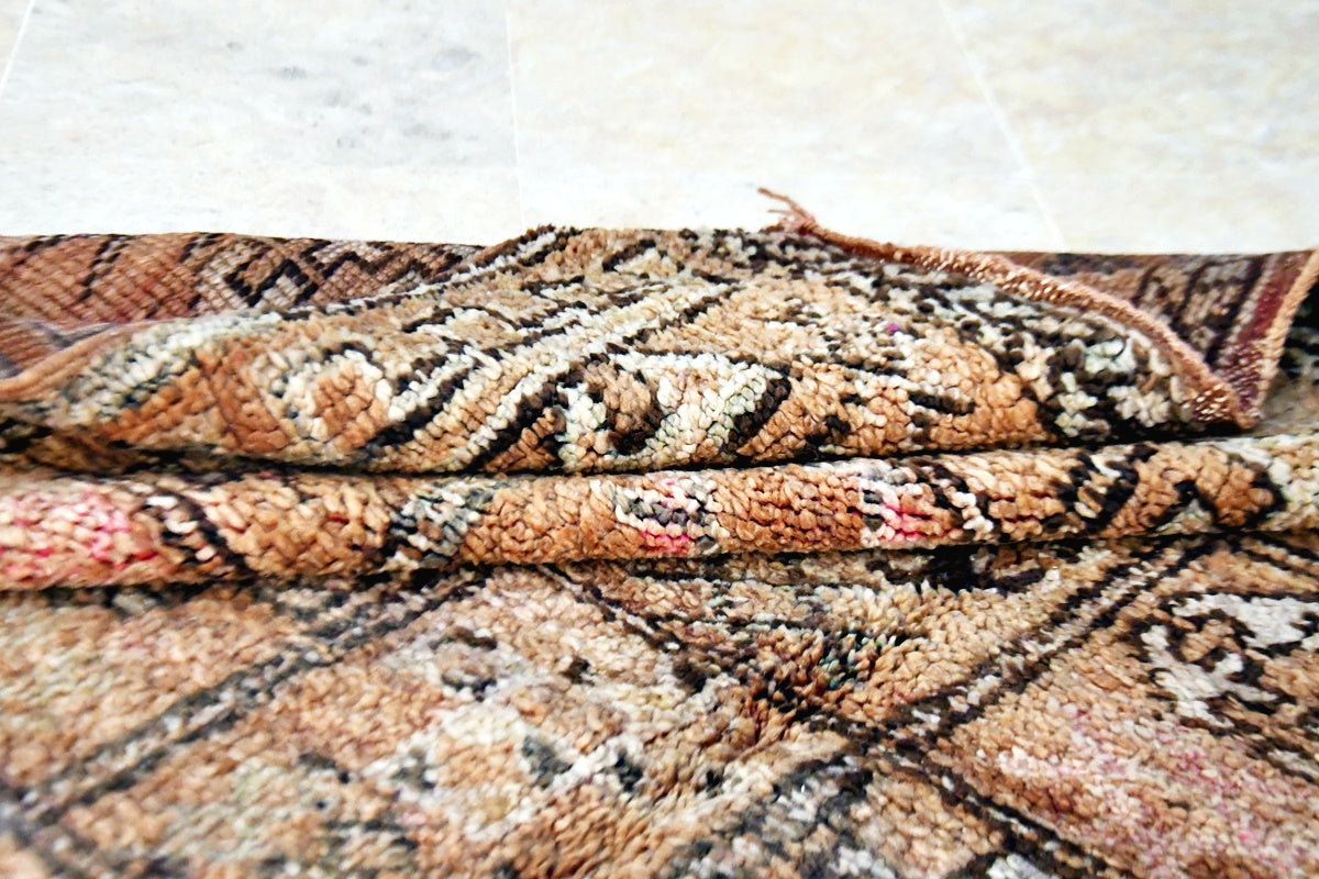 Dark rust pink zemmour rug folded