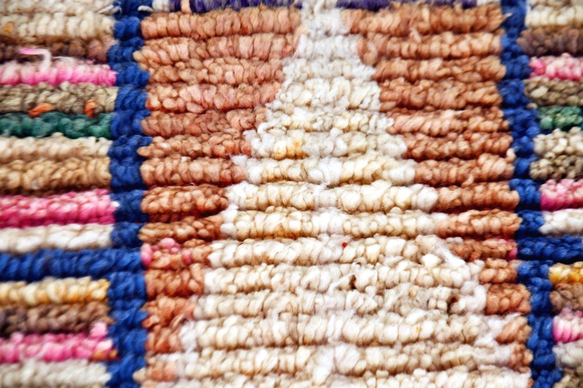 Morocan boujaad runner wool rug stripped purple pink close up