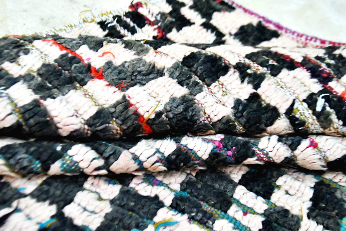 Moroccan vintage checker runner wool rug folded