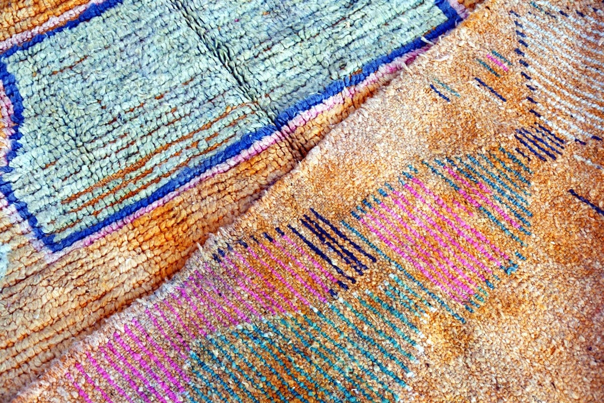 Orange blue abstract moroccan area rug back