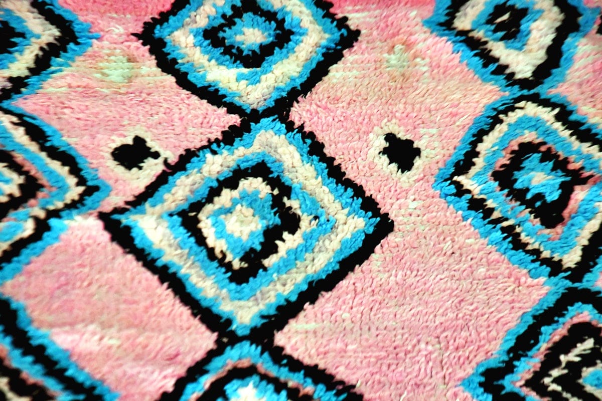 Pink Boujaad vintage runner rug with blue diamonds close up