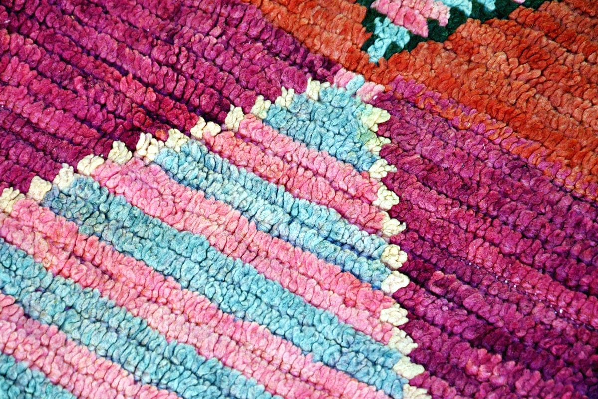 Red moroon vintage boujaad runner rug abstract close up