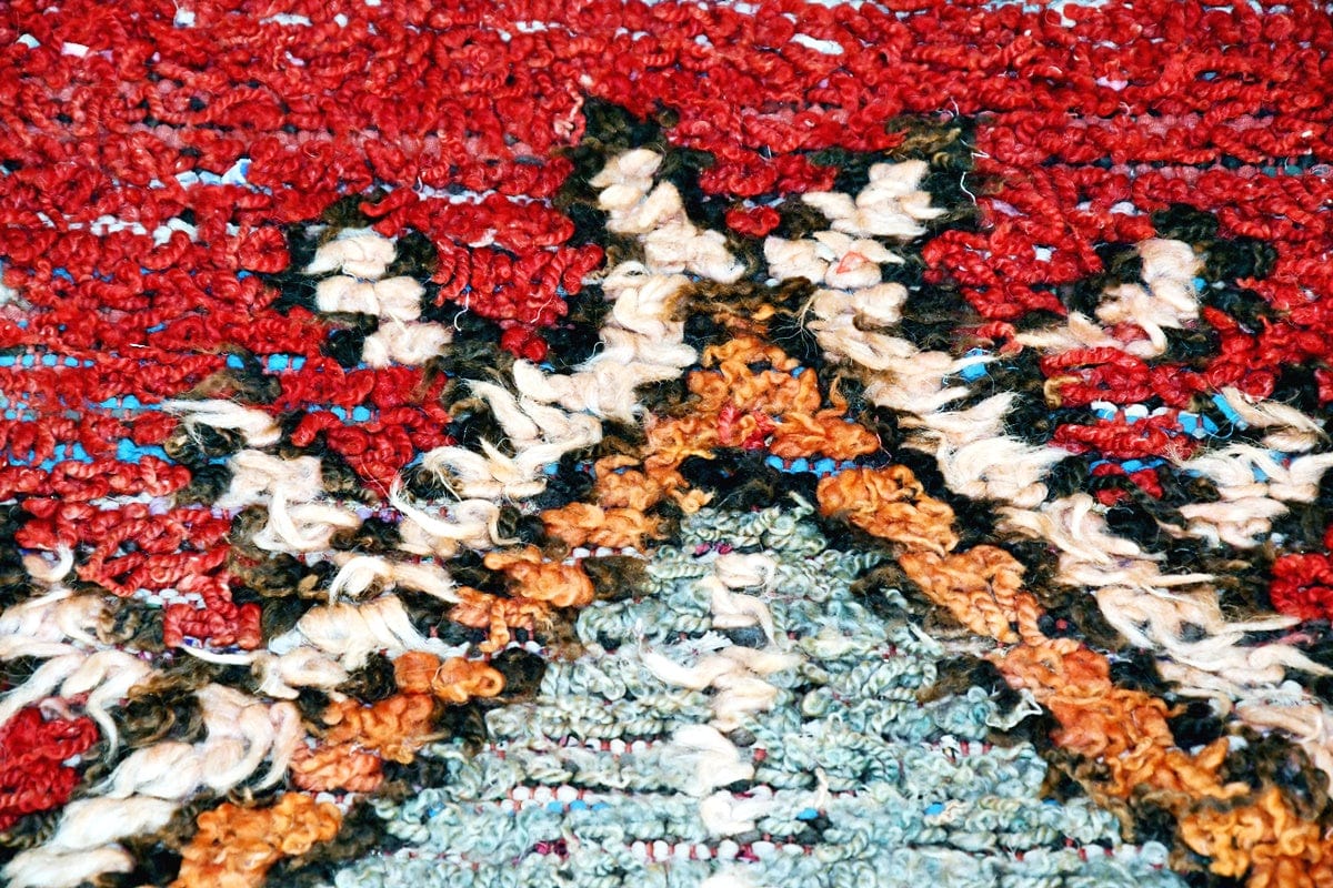 Red purple runner Boujaad Moroccan wool rug close up