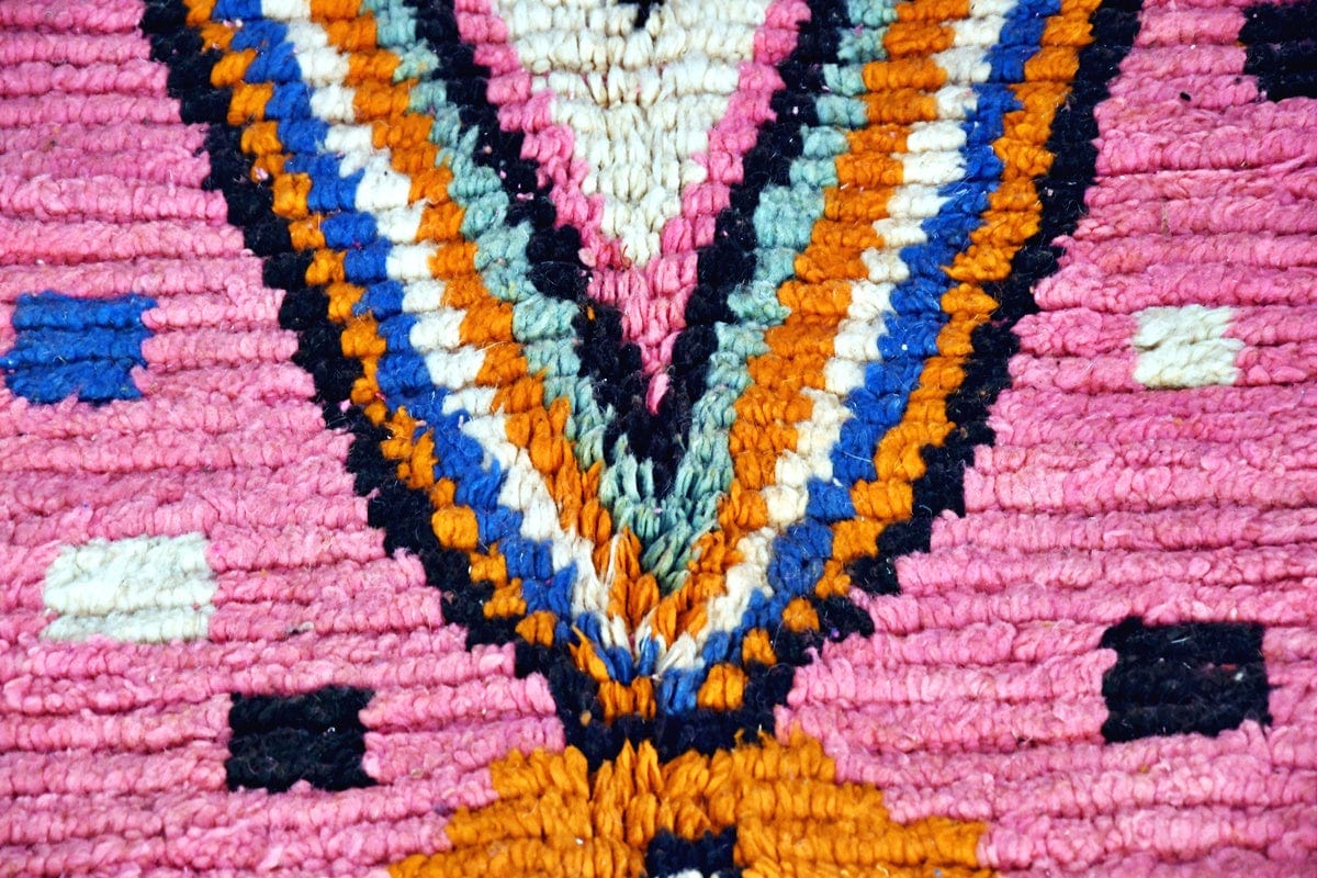 Pink abstract moroccan boujaad rug close up