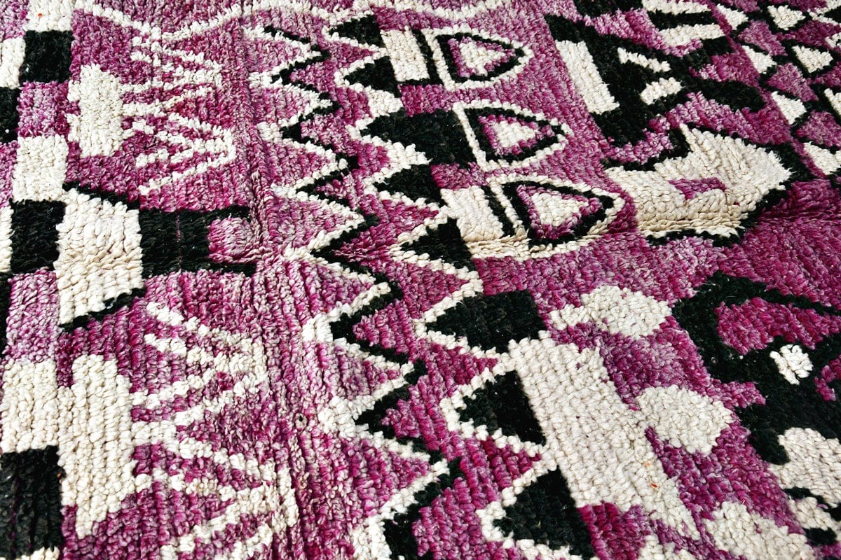 side shot moroccan boujaad rug purple black white plush pile
