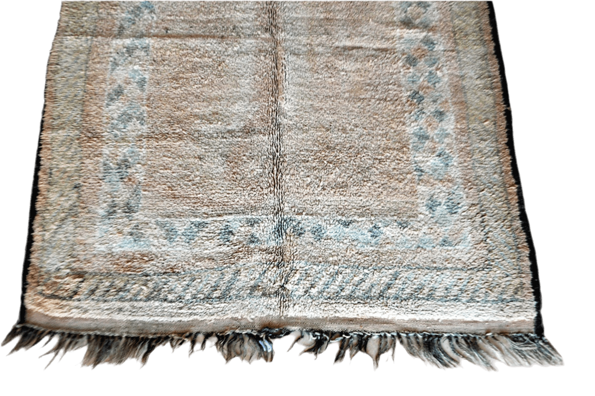 faded earthy tones vintage boujaad rug bottom tassels