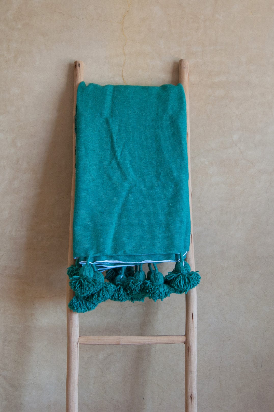 TEAL_POM_POM_THROW