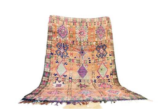 Beni Mguild pastel area rug morocco standing