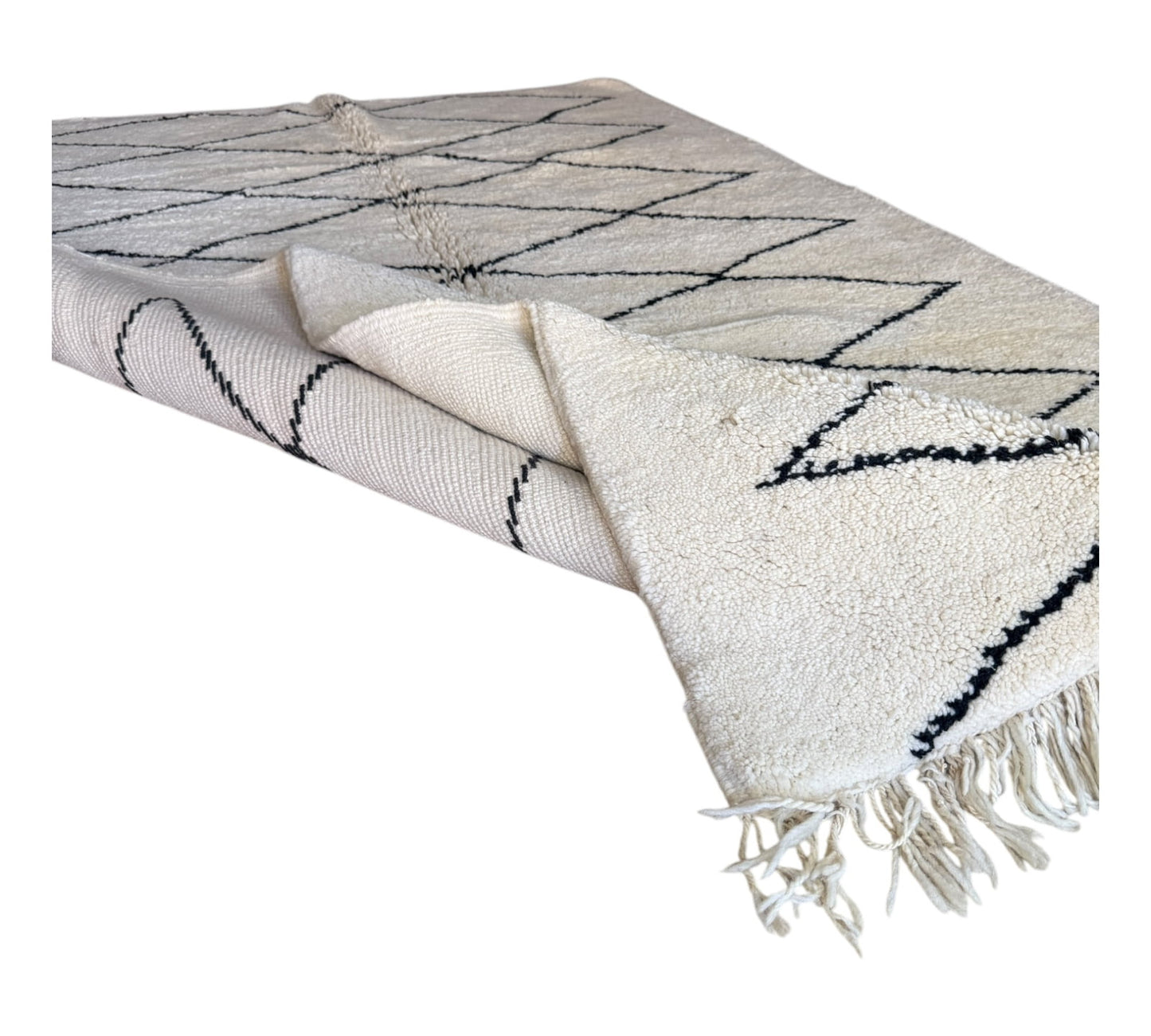 Beni ourain tight diamond white black rug folded