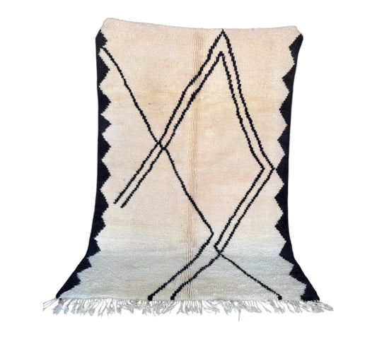 Black and white Beni Ourain rug standing