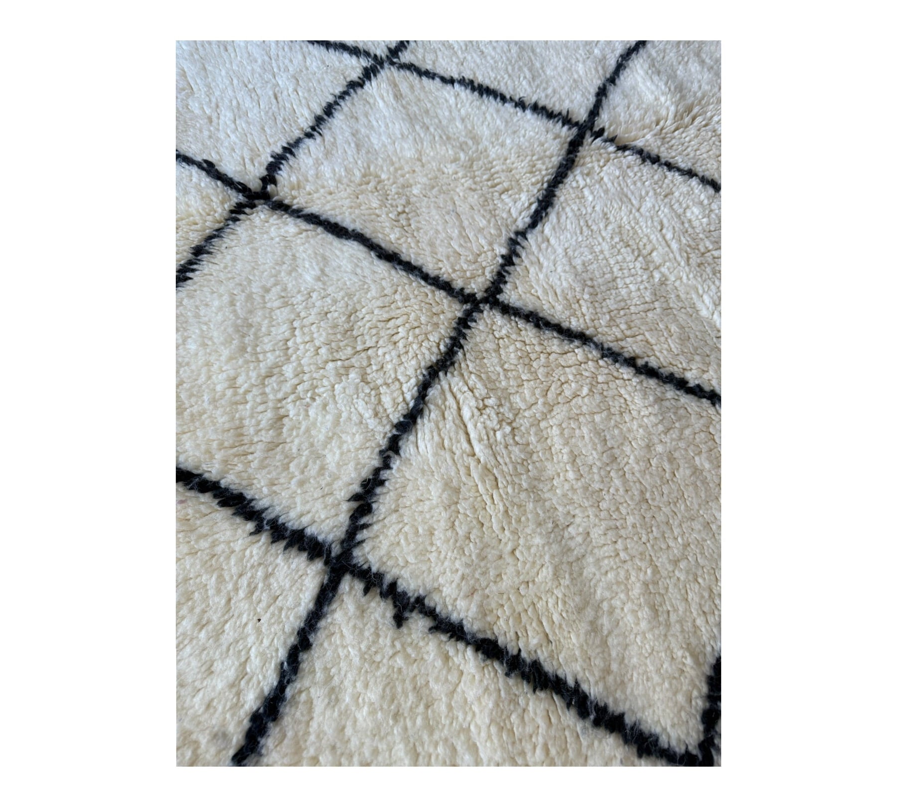 Black and white  diamonds Beni Ourain rug top plush pile close up