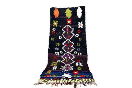 Black purple green moroccan boucherouit rug morocco outdoor standing