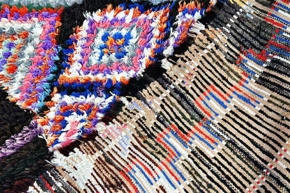 Boucherouite black blue rug close up folded
