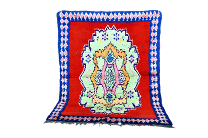 Bright red blue Moroccan boucherouite rag rug standing