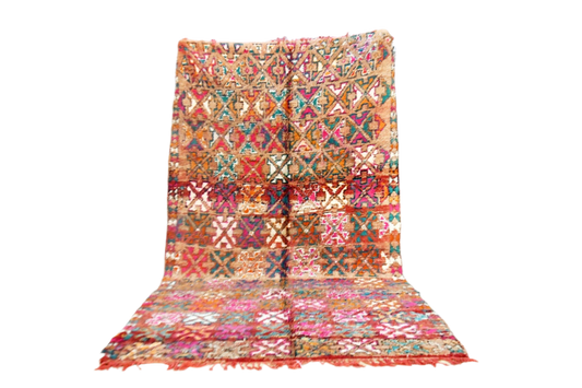 Bright red pink green vintage moroccan zemmour rug standing