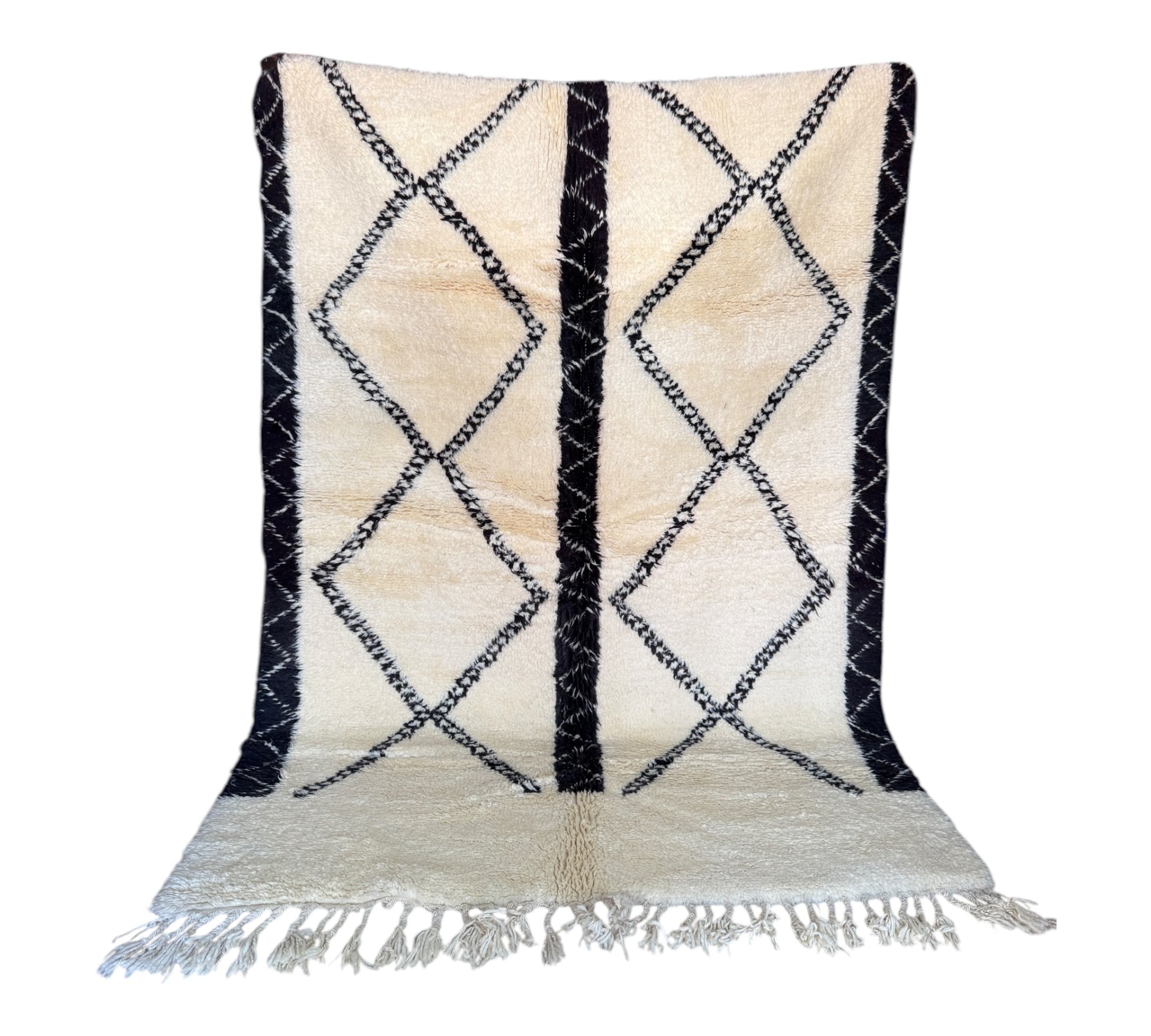 Double diamond beni ourain rug back standing