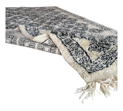 Flowers black and white vintage beni ourain moroccan rug folded