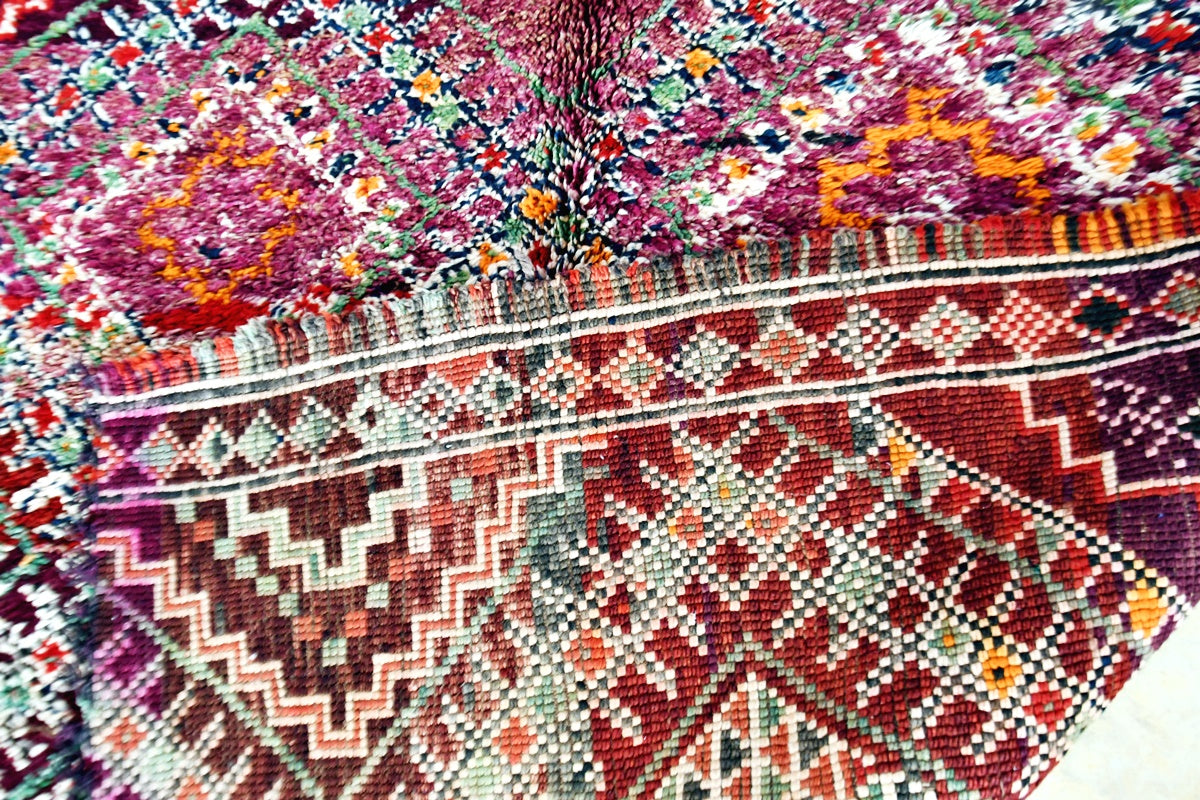 Folded Beni Mguild vintage collector rug