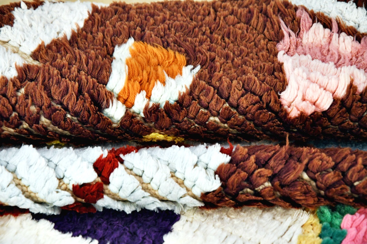 Folded Boucherouite vintage rug 