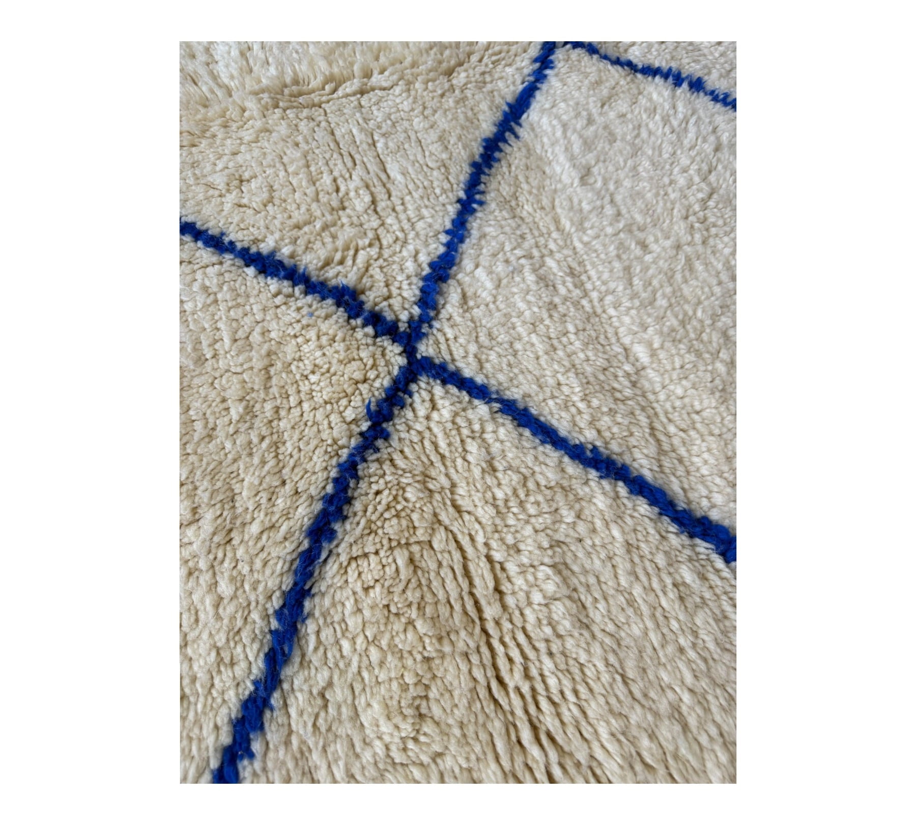 Mediteranean Beni ourain white blue rug top closeup