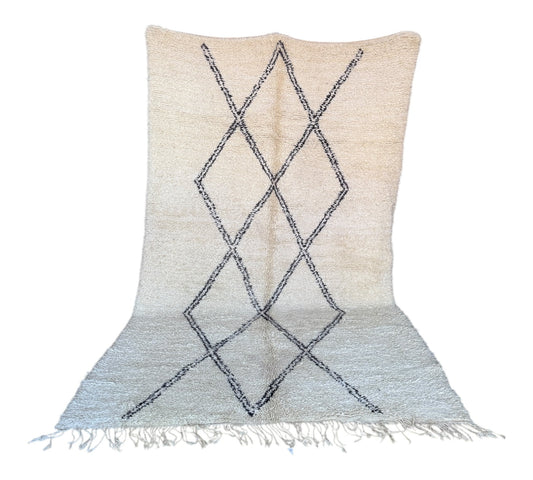 Minimalist vintage beni ourain rug morocco white black standing