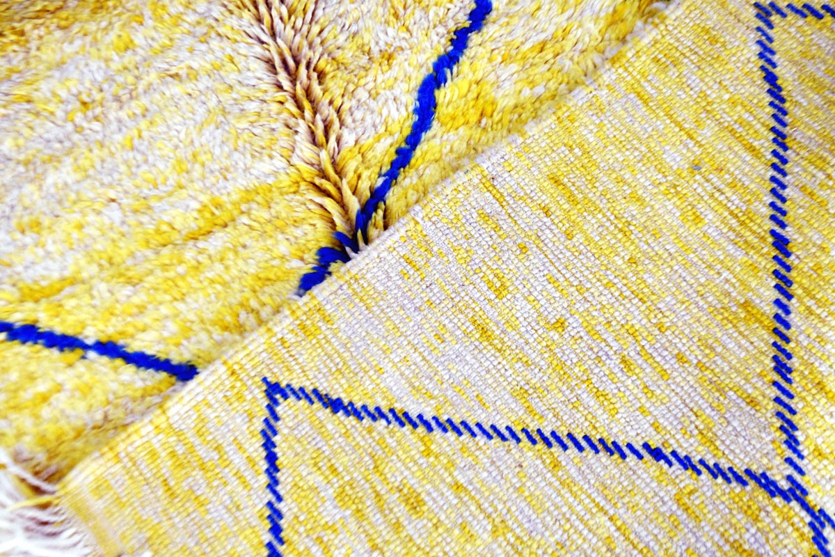 Moroccan beni mrirt yellow blue rug