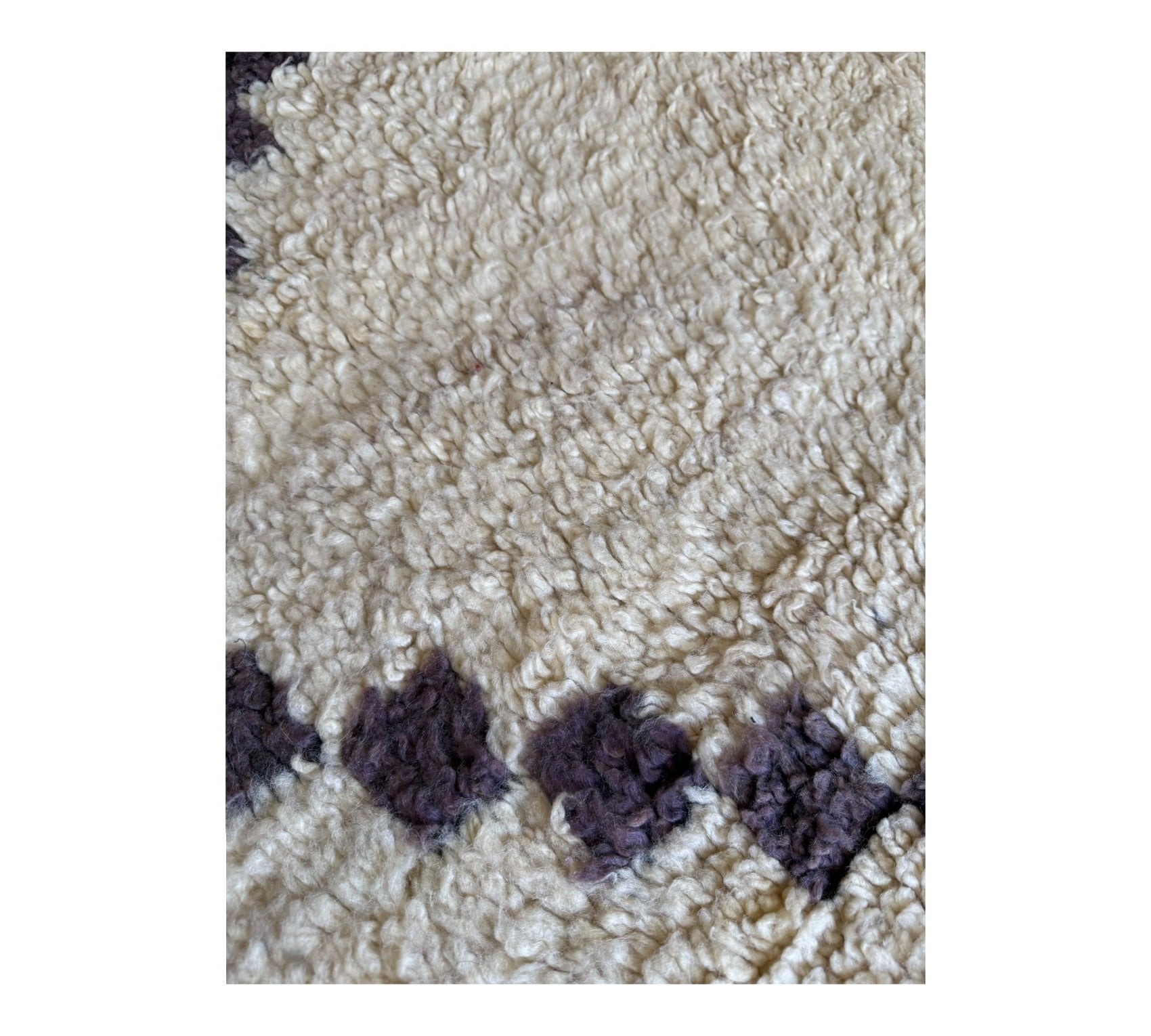 Moroccan vintage beni ourain rug white faded black close up