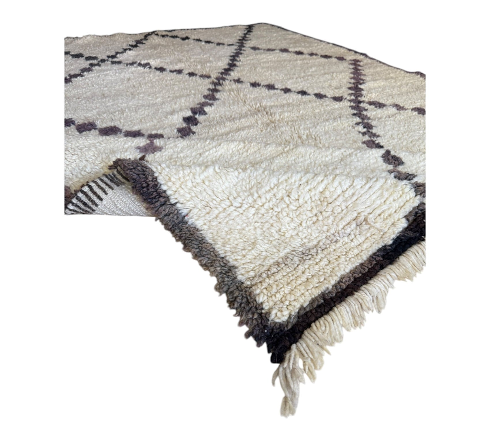 Moroccan vintage beni ourain rug white faded black folded