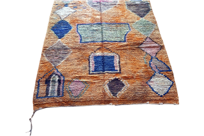 Orange blue abstract moroccan area rug 