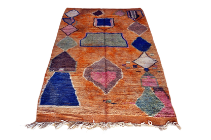 Orange blue abstract moroccan area rug fringe 1