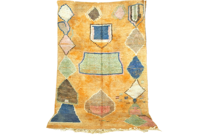 Orange blue abstract moroccan area rug standing