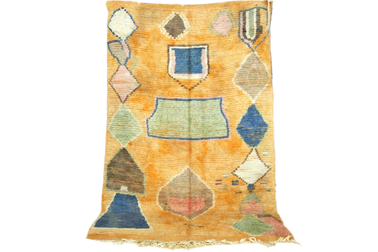 Orange blue abstract moroccan area rug standing