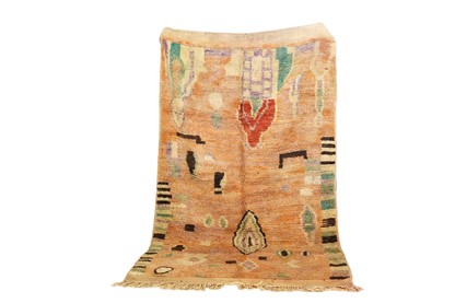 Peach mint abstract moroccan area rug standing