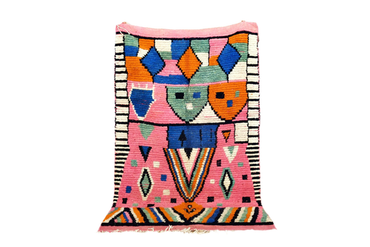 Pink blue orange abstract boujaad area rug morocco standing