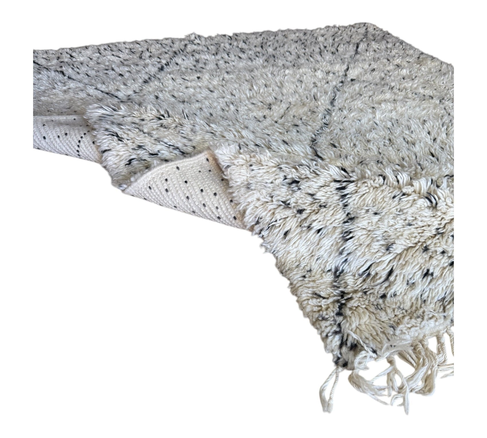 Polka dots beni ourain rug closeup plush folded