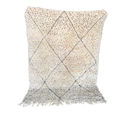 Polka dots beni ourain rug closeup plush standing