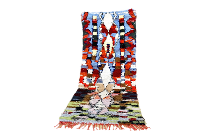 Red blue boucherouite rag rug morocco standing