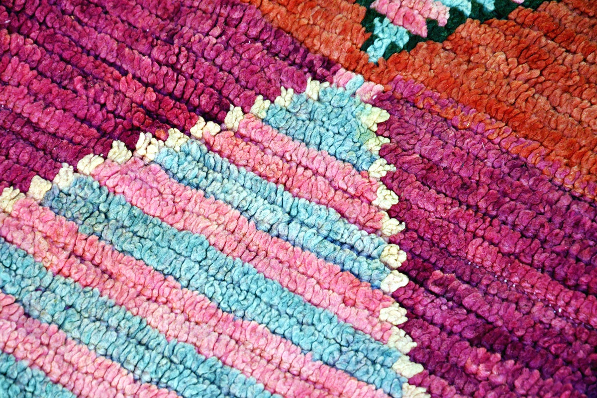 Red moroon vintage boujaad runner rug abstract close up