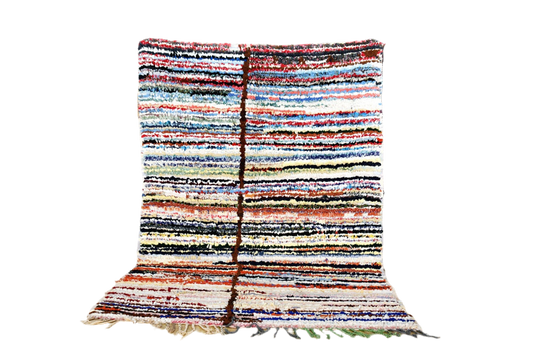 Striped Moroccan Boucherouite rug blue red white black standing