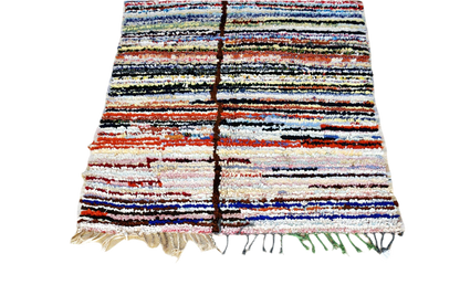 Striped Moroccan Boucherouite rug blue red white black tassels
