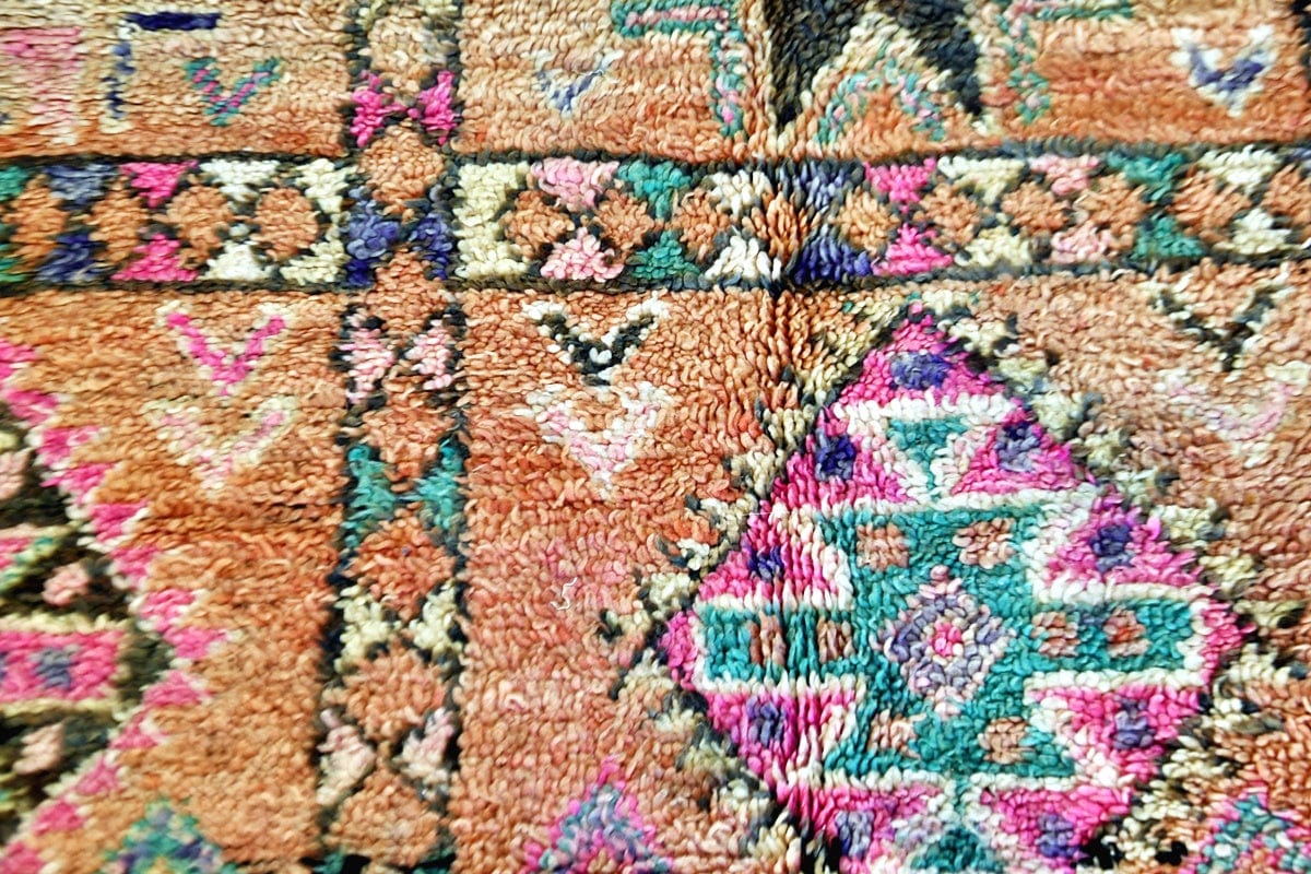 close up pastel beni mguild rug geometric