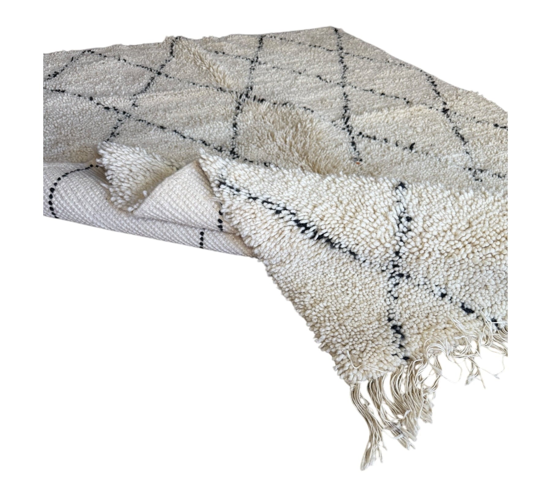 white & black diamonds symethrical beni ourain moroccan rug folded