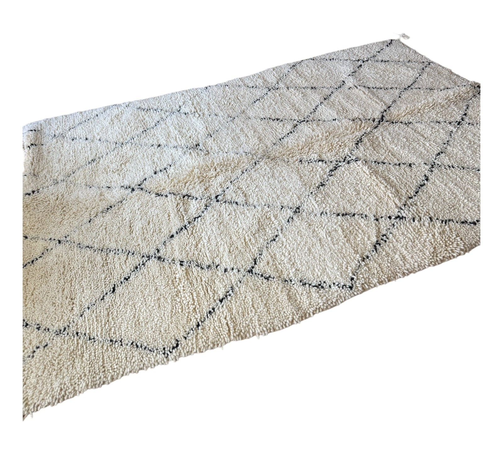 white & black diamonds symethrical beni ourain moroccan rug side shot