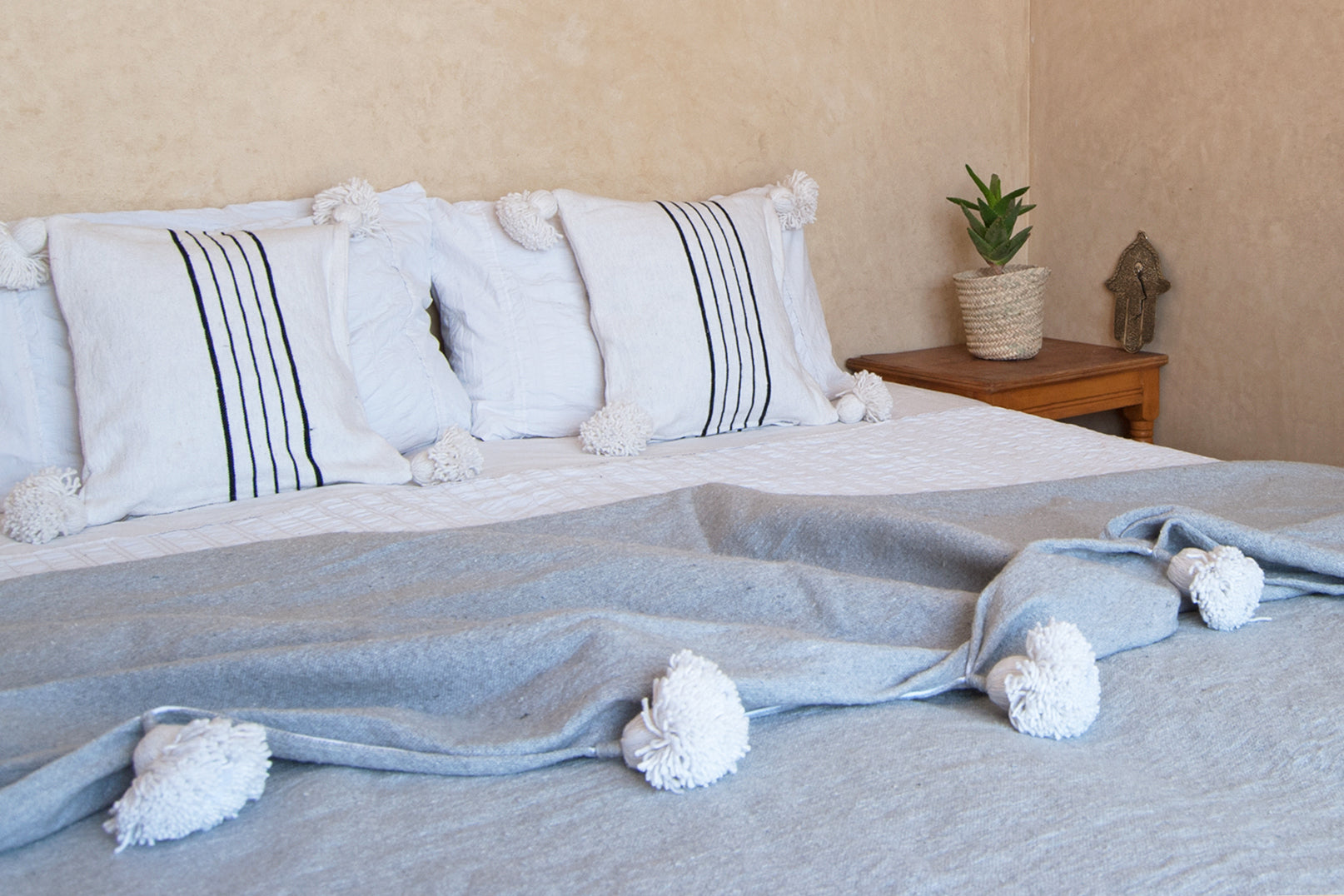 Grey White  pompom bedspread lifestyle